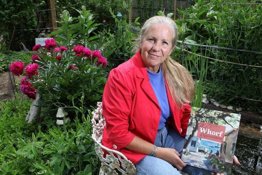 Amy Whorf McGuiggan with book